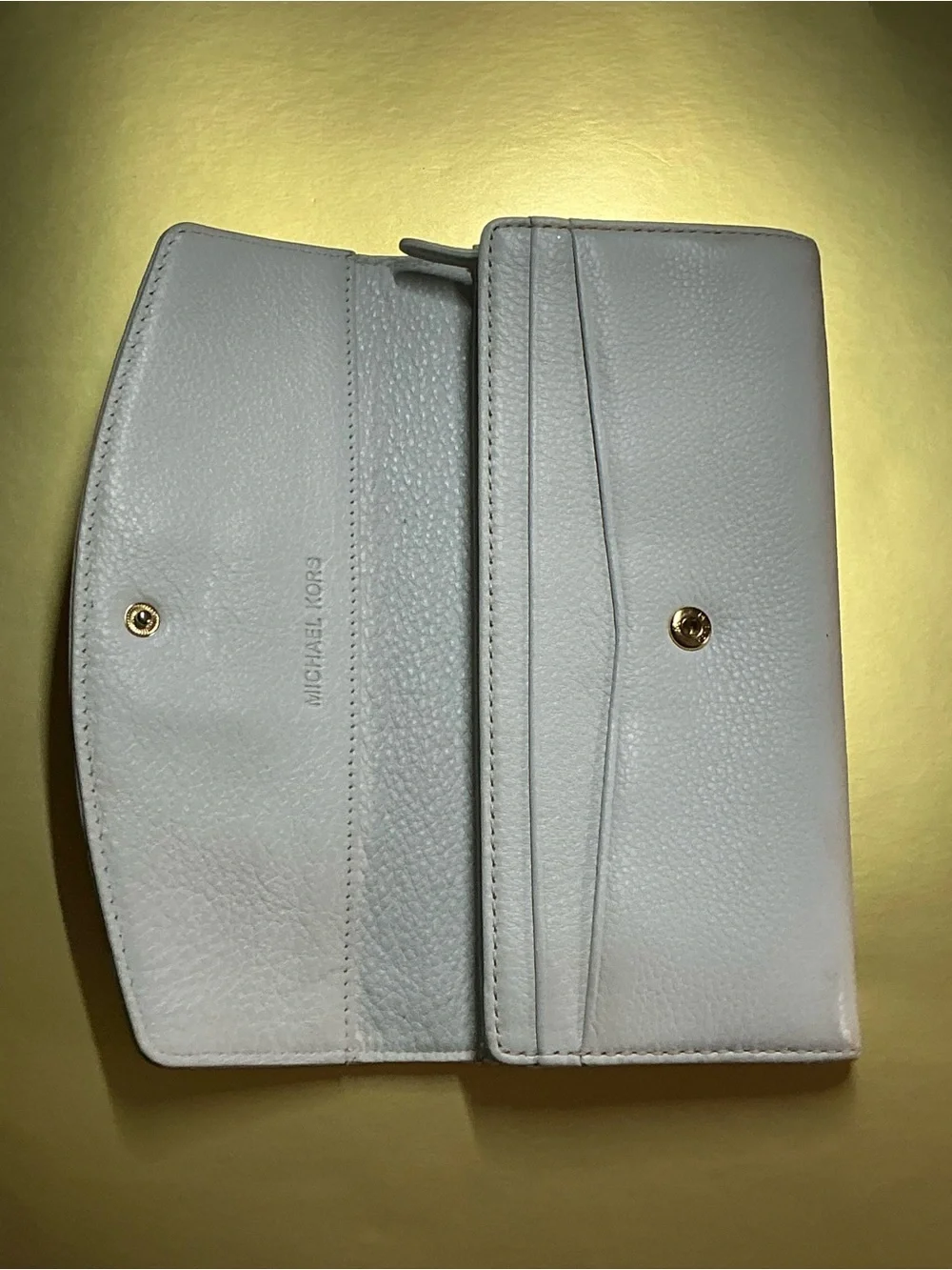 Michael Kors previously owned